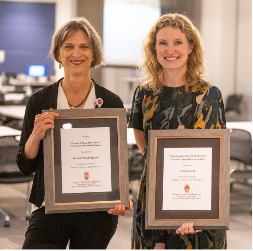 Doctors Betsy Trowbridge, MD, and Kelly Lavin, MD, pose with certificates recognizing their endowed positions.